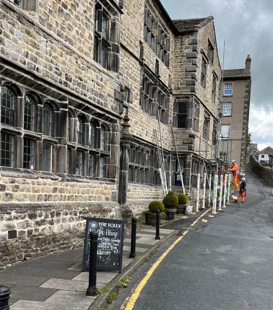 Scaffolding being erected around The Folly in April 2026