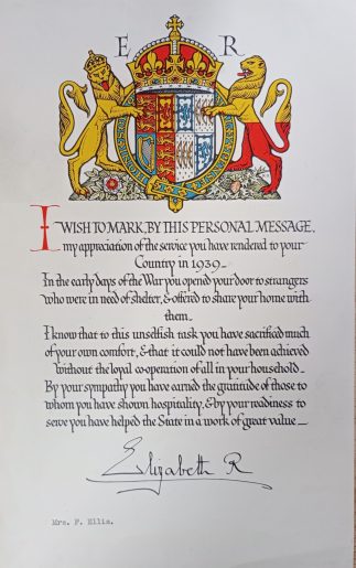 A printed letter with royal crest and hand-signed "Elizabeth R"