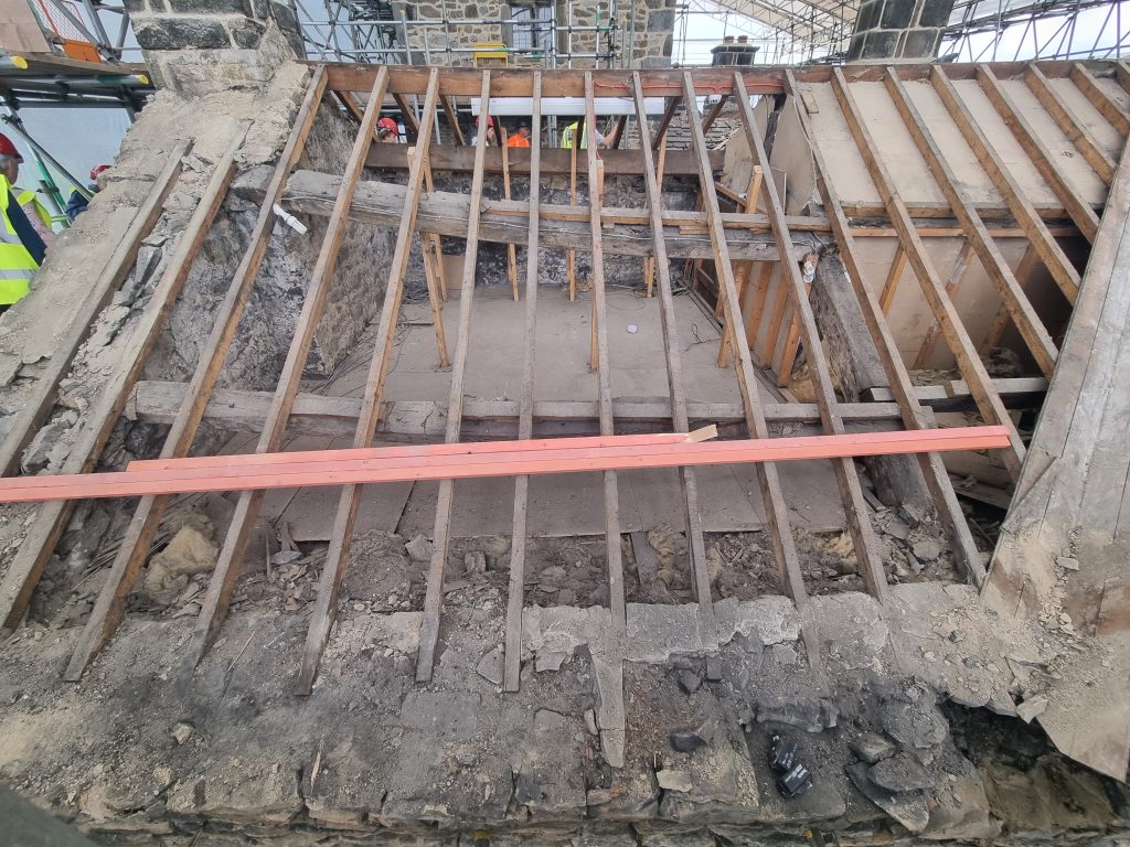 The roof at The Folly stripped for reslating, with older and more modern timbers exposed
